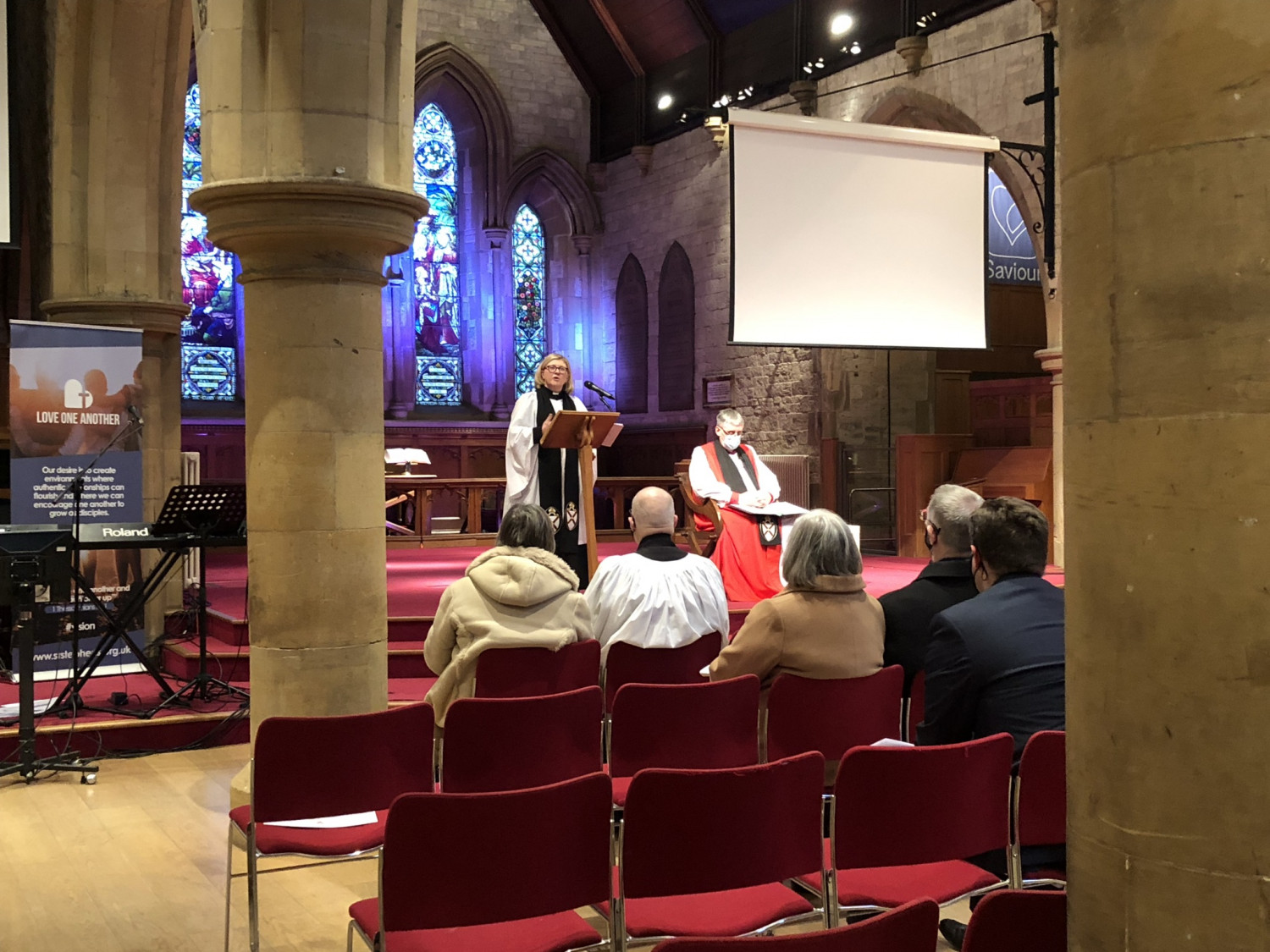 Archdeacon Sharon leads the prayers